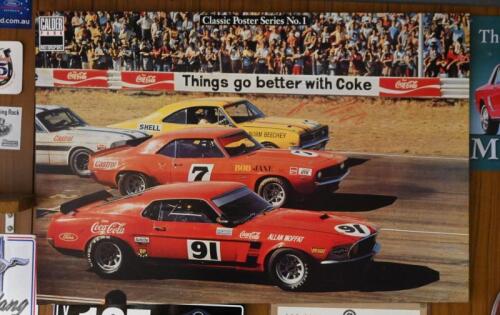 CALDER: A poster from the "Calder Park Motor Sport Classic Poster Series No.1" depicting a Calder start grid, signed by Norm Beechey in orange marker, mounted on board, 54.5cm high x 81cm wide.