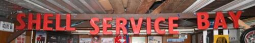 SHELL: An original "SHELL SERVICE BAY" perspex lettered sign, some damage, in three sections.