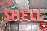SHELL: An original "SHELL SERVICE BAY" perspex lettered sign, some damage, in three sections. - 2