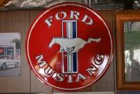 MUSTANG: A large reproduction embossed tin Ford Mustang sign, 59.5cm diameter, Ford licenced product.