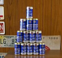 FOSTERS: A collection of 13 commemorative Adelaide GP beer cans, eight of 1986 and five 1987, emply