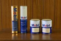 MOBIL: Two Mobil oil cylindrical tins and two one pound grease tins