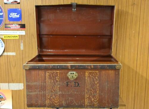 TRUNK: A larger circa 1950s metal steamer truck, with the initials on front "F.D", latch later, 43.5cm high x 71cm wide x 47cm deep