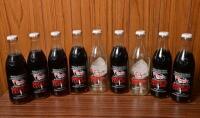 COKE: A collection of Commemorative Coke bottles for the 1987 America Cup, most sealed.