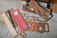 HOLDEN: A collection of engine related items including two manifolds, one numbered 7429469, two Stromberg carbys and a large collection of miscellaneous gaskets - 7