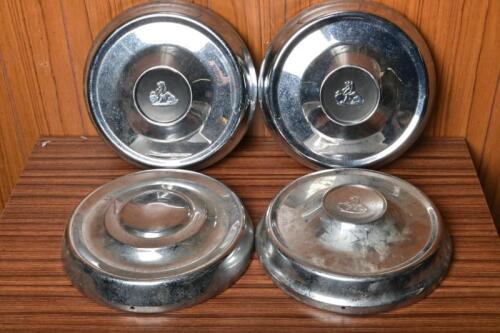 HOLDEN: Four original Holden hubcaps