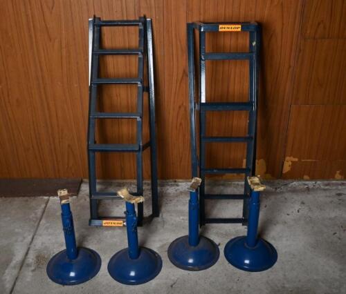 EQUIPMENT: Two drive up garage ramps and four stands.