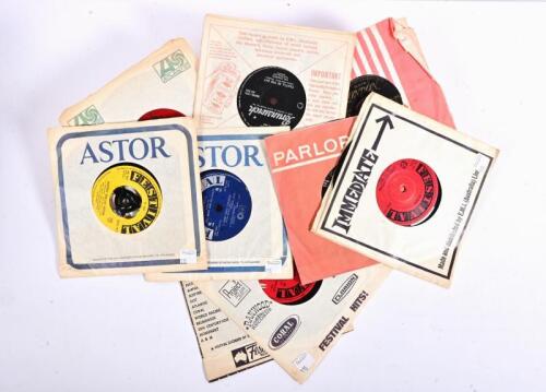1950s: Nine 45 RPM records featuring Bill Haley, The Crickets, Fats Domino and others