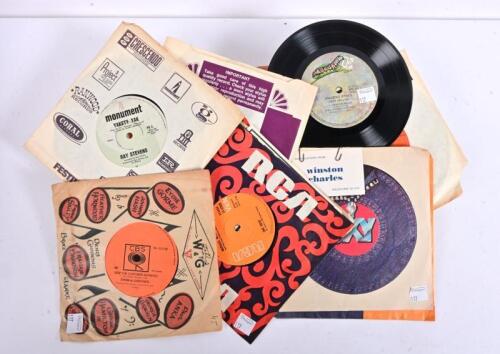 1970s/1980s: Seven 45 RPM records featuring, Simon and Garfunkel, Slade, Ray Stevens and others