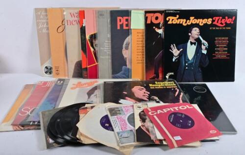 CROONERS: Thirty-two records including seventeen LPs and fifteen 45 RPM records featuring Tom Jones, Frank Sinatra, Tony Bennett, Johnny Mathis, Engelbert Humperdinck, Mario Lanza and others