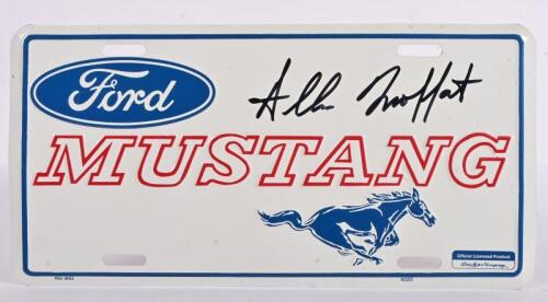 MUSTANG: An official licenced Ford Mustang pressed tin number plate hand signed by Allan Moffat