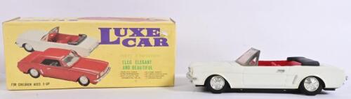 FORD: A 1:18 scale friction driven model of a 1966 Ford Mustang, in box