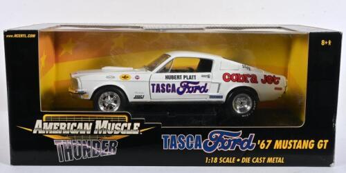FORD: A 1:18 scale American Muscle Thunder 1967 Ford Mustang GT as driven by Hubert Platt, loose in box