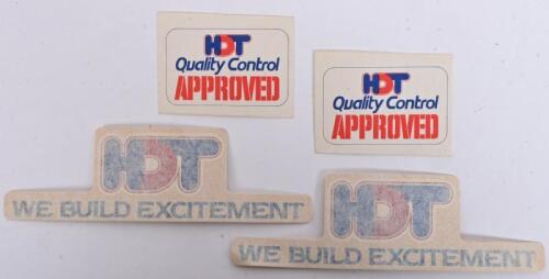 HDT: Two original HDT We Built Excitement window stickers and two HDT Quality Control Approved stickers, all unused 13 x 4cm and 4 x 6cm