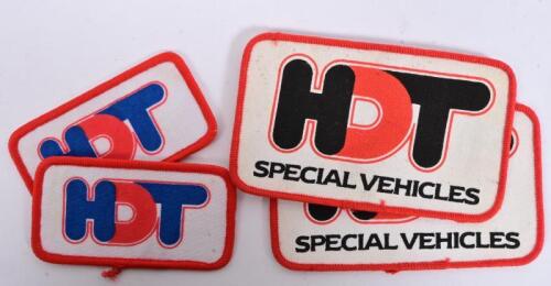 HDT: Two HDT cloth patches as per the 1986 merchandising catalogue code no 75306, and two HDT special vehicles cloth badges, 4.5 x 8cm and 7 x 11cm