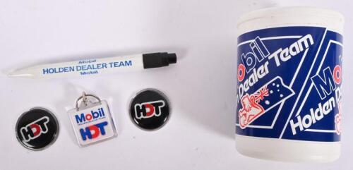 HDT/HDT: Two HDT medallions, an MHDT pen and stubby holder, and an MHDT keyring as per the 1986 merchandising catalogue code no 75303