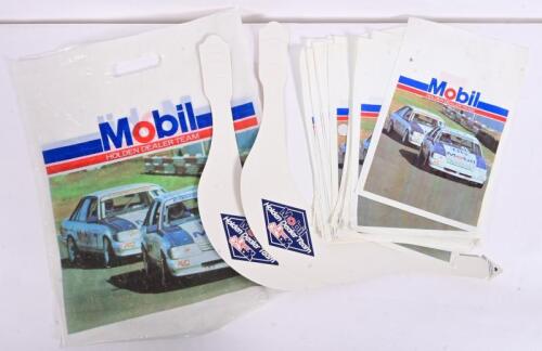 HDT: A collection of MHDT promotional material, comprising approximately thirty plastic rubbish bags for a VL, two cardboard sun visors and a another plastic bag