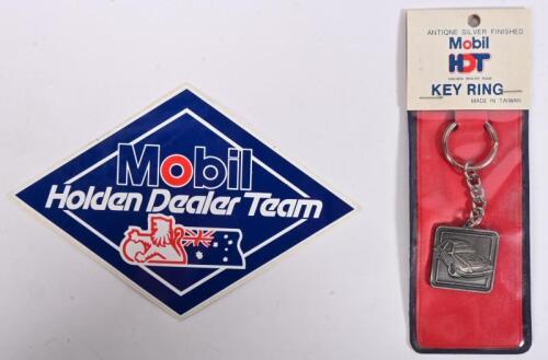 HDT: A MHDT NOS keyring in original packaging, as per the 1986 merchandising catalogue code no 75302, and a MHDT sticker