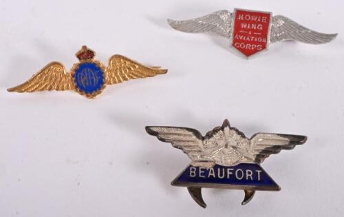 WWII LAPEL BADGES: An interesting group of three WWII lapel badges including 'BEAUFORT', 'HOWIE WING AVIATION CORPS', 'RAAF' badges, all circa 1940's