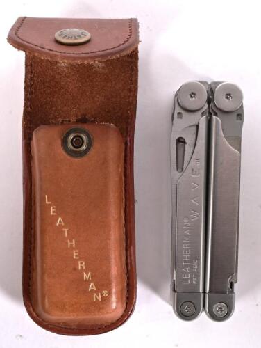 LEATHERMAN: An original 'LEATHERMAN WAVE' stainless multi tool in leather sheath