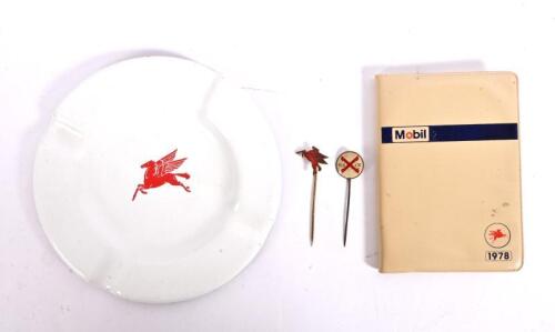 MOBIL: A small group of Mobil ephemera including a red Pegasus ashtray, a red Pegasus pin badge, Mobil 1978 small format diary, together with REDEX pin badge
