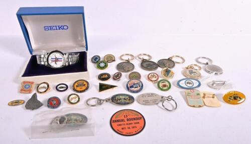 BADGES/KEYRINGS: An interesting quantity of key rings and badges including various Model A Ford Restorers Club badges, together with Seiko Mustang watch and box.
