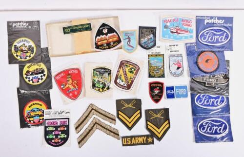PATCHES: A collection of cloth badges, including Ford and US Army