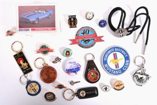 MUSTANG: A collection of Mustang related material, including keyrings, cards, lapel pins and badges