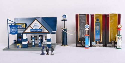 FORD: A model Ford service station diorama and various scale model petrol pumps and two lead figures