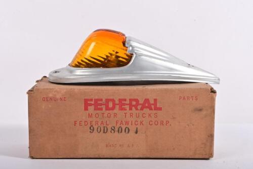 INDICATOR LAMP: A circa 1950s indicator lamp, amber glass embossed LS303
