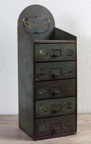 HURET: A vintage small steel wall mounted point of sale set of drawers, 64cm high 23cm wide,22cm deep