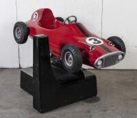 RACE CAR RIDE: A circa 1960/70s RGM Red Flash coin operated race car amusement ride in the form of a open wheel Grand prix racing car, last know operation was in 2005, recently untested, complete with coin slot mechanism stored inside base, 95cm high, 16 - 2
