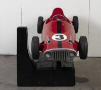 RACE CAR RIDE: A circa 1960/70s RGM Red Flash coin operated race car amusement ride in the form of a open wheel Grand prix racing car, last know operation was in 2005, recently untested, complete with coin slot mechanism stored inside base, 95cm high, 16 - 3