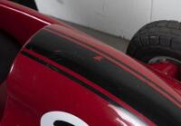 RACE CAR RIDE: A circa 1960/70s RGM Red Flash coin operated race car amusement ride in the form of a open wheel Grand prix racing car, last know operation was in 2005, recently untested, complete with coin slot mechanism stored inside base, 95cm high, 16 - 7