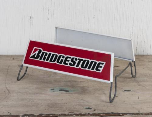 BRIDGESTONE: A Bridgestone tyre stand, 17cm high, 34cm wide, 28cm deep