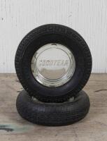GOODYEAR: Two Goodyear novelty ashtray in the form of a tyre with grass inserts, 14.5 and 15cm diameter