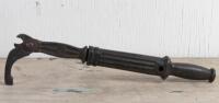GRIPS: An early set of cast iron grips with extendable handle, 57cm long when extended