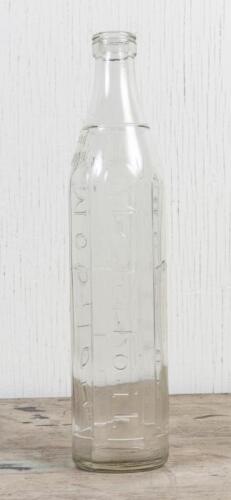 MOBIL: A circa 1930s one imperial quart embossed glass oil bottle