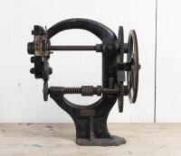 LEATHERWORKING: A cast iron device probably for impressing a trimming leather, 39.5cm high - 2