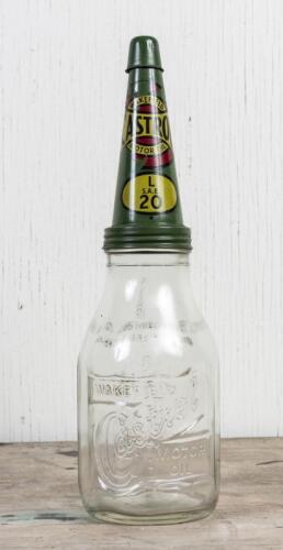 CASTROL: A circa 1950s Castrol Wakefield one imperial quart embossed glass oil bottle with reproduction L SAE 20 tin pourer
