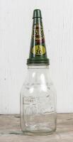 CASTROL: A circa 1950s Castrol Wakefield one imperial quart embossed glass oil bottle with reproduction L SAE 20 tin pourer