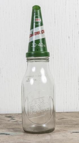 CASTROL: A circa 1960s Castrol Wakefield one quart embossed glass oil bottle with later CW 30-40 SC plastic pourer