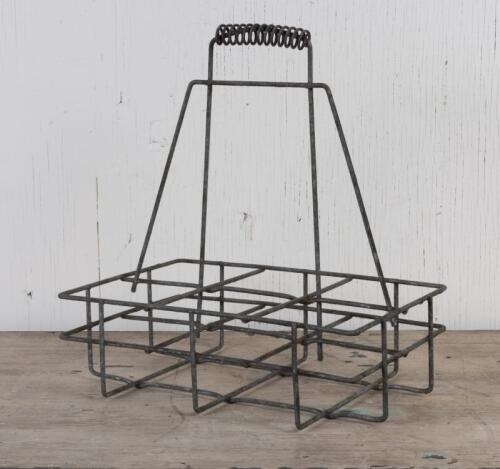 OIL BOTTLE RACK: A vintage wire oil bottle rack with handle, 40cm high, 37cm wide, 25cm deep