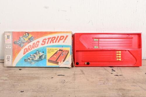 DRAG STRIP: A vintage board game Drag Strip by Milton Bradley, made in Australia, lacking two cars and a trigger
