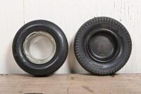 DUNLOP: Two Dunlop novelty ashtrays in the form of a tyre, one Bakelite inserts, 15.5 and 15cm diameter