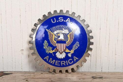 USA: A USA America enamelled grille badge, 8cm diameter