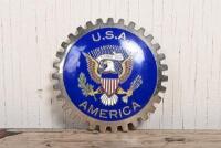 USA: A USA America enamelled grille badge, 8cm diameter
