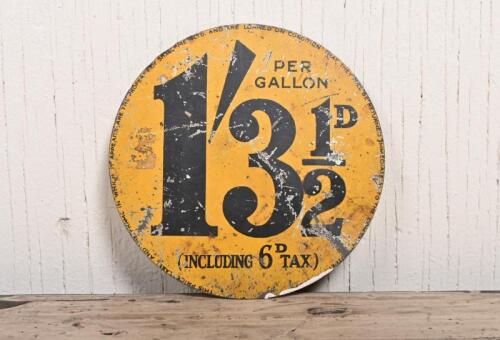 BOWSER: An early tin petrol bowser price medallion, 9.5cm diameter