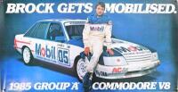 BROCK: An original poster featuring "Brock Gets Mobilised, 1985 Group A Commodore V8", 37.5cm high x 73cm wide