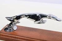 DELAGE: A 1920s nickle plated 'Leaping Greyhound' for Delage after Casimir Brau mounted on wooden stand, later replated, 18cm long - 2